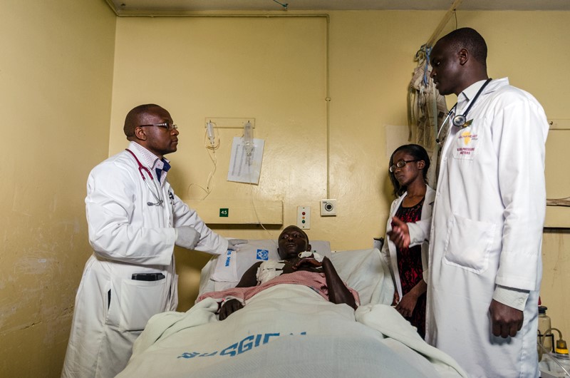 AMH physicians working with a patient at the Kijabe hospital