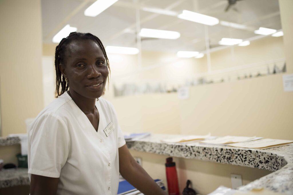 A healthcare worker posing for a picture