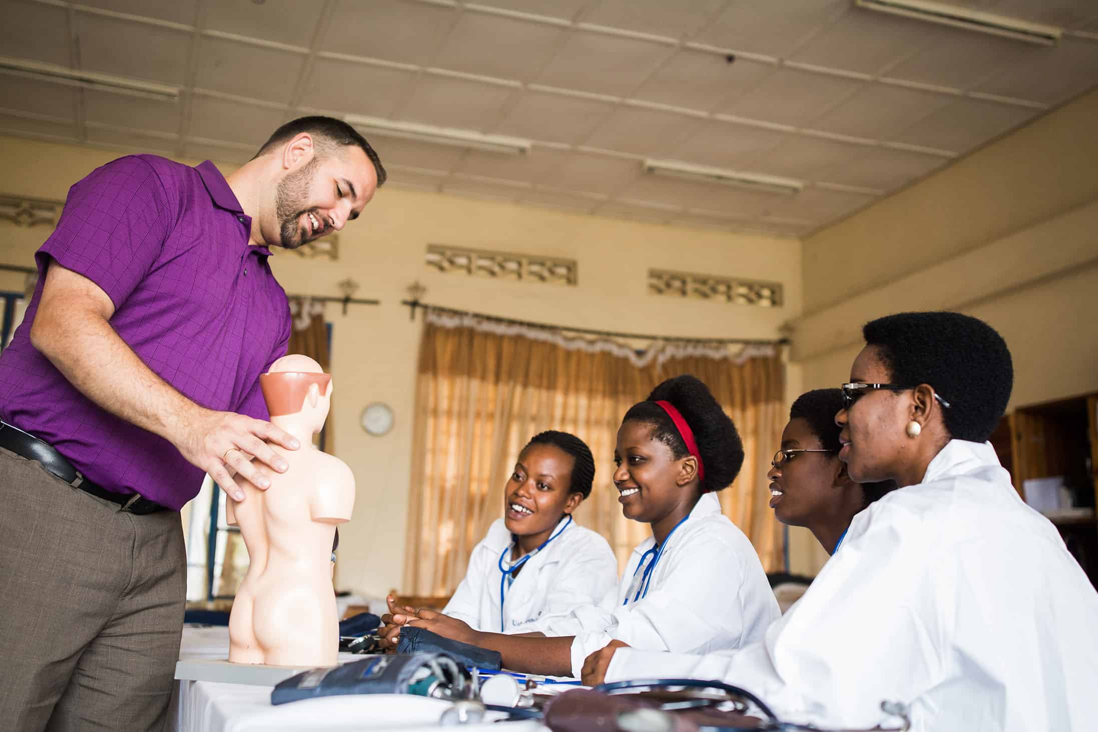 Group of 4 doctors having a class