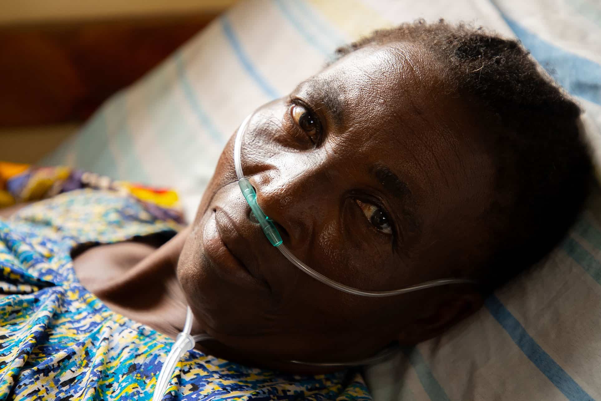 A woman with a nasal cannula