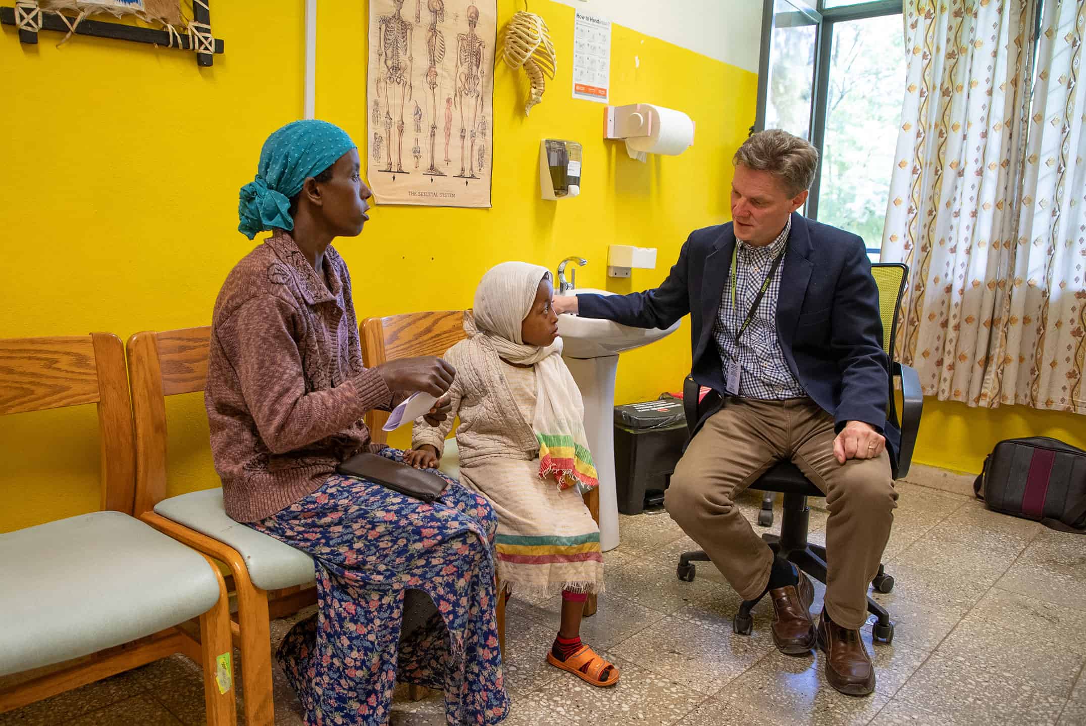 Doctor talking with his patients