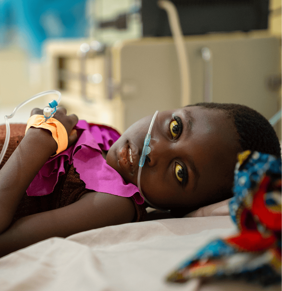 A young African girl receiving oxygen