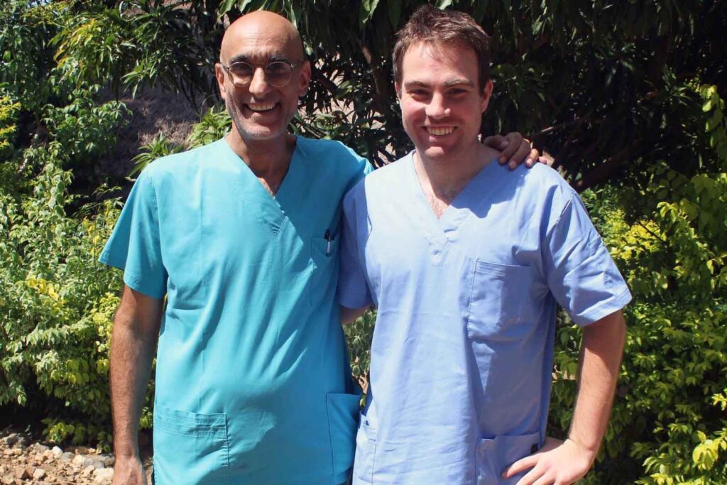 Dr. Gary Ulrich and Dr. Tom Catena standing together outside Mother of Mercy Hospital